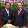 PM urges ministries of Vietnam, Laos to foster economic links