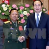 President urges Vietnamese, Lao armies to boost ties 