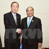 PM meets Australia counterpart, UN leader in Vientiane