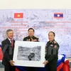 Nearly 100 photos, maps handed over to Lao museum