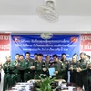 Vietnam People’s Army presents information equipment to Laos