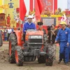 President prays for good crop at ploughing festival