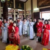 Buddhist wedding ceremony organised for 14 couples in Hanoi