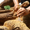 Traditional laterite building and architect in Thach That