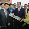 President Tran Dai Quang visits National Press Festival 2018