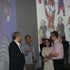 More than 100 Hang Trong paintings presented in the 3D mapping technology, in combination with modern sound and light. (Photo: VNA)