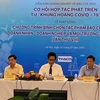 The forum discusses how businesses and the press can seize opportunities from the COVID-19 crisis to cooperate and grow together. (Photo: VietnamPlus)