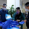 Protective equipment has been delivered to reporters and editors at the Press Photography Department under the Vietnam News Agency to prevent COVID-19 (Photo: VNA)