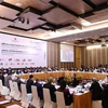 Summit session of annual Vietnam Business Forum themed “Restoring the economy and developing supply chain in the new normal” on February 21. (Photo: VNA)
