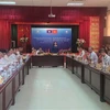 Hanoi, Vientiane improve State management in industry, trade