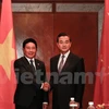  Vietnam, China FMs meet on sidelines of AMM 48