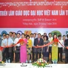 First exhibition on Vietnam’s tertiary education underway in Laos 