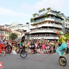 Circus march enchants wanderers in pedestrian streets