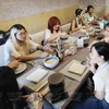 Young people enjoy pottery making