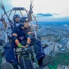 Admiring Ho Chi Minh City while paragliding