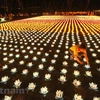 Vesak lanterns floated to pray for peace 