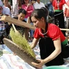 Tu Le young sticky rice flake festival