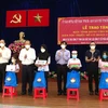 Tablets presented to help disadvantaged students in HCMC study online