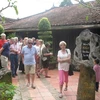 Opulent houses in Dong Hoa Hiep ancient village attracts visitors