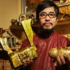 Artist welcomes New Year with feline statuettes