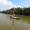 Paddling down Saigon River for fun