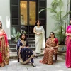 A photo capturing different kinds of Indian women’s traditional dress wins first prize at a photo contest organised by the Vietnam – India Friendship Association in Hanoi. 