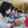 Students of Ethnic Boarding School in the Central Highlands province of Kon Tum attend the Vietnam Book and Reading Culture Day. (Photo: VNA)