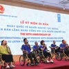 At the ceremony to mark the 30th anniversary of International Day of Persons with Disabilities (Photo: VNA)