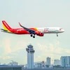 Vietjet aircraft bearing Ho Chi Minh City tourism symbol lands at Tan Son Nhat airport