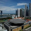 Singapore lowers economic growth forecast