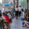 Hanoi to clear sidewalks of cars, beer joints