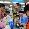Experts: Cashless economy target too high