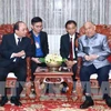 PM Nguyen Xuan Phuc visits Lao former Party, State leaders