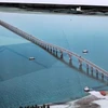 Southeast Asia’s longest cross-sea bridge close to completion 