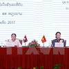 Vietnam, Laos share experience on land management