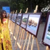 Photo exhibition marks ASEAN’s 50th anniversary in Hanoi 