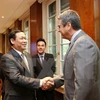 Deputy PM Vuong Dinh Hue meets WTO leaders