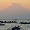 Indonesia: Thousands evacuated as volcano rumbles on Bali resort island