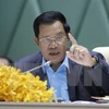 Cambodian PM vows to take hard line with treason