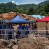 Malaysia: 11 people dead, missing in landslide 