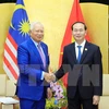 APEC 2017: President Tran Dai Quang meets Malaysian PM 