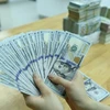 Reference exchange rate down by 4 VND at week’s beginning