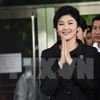 Thai ex-PM Yingluck yet to have UK passport: official