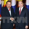 PM Nguyen Xuan Phuc meets Lao Party and State leader 