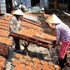 Farmers prepare special food for lunar New Year