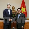 Deputy PM Pham Binh Minh receives John Kerry 