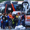 Free coaches bring workers home for Tet