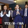 President Tran Dai Quang talks with Vietnamese expats in India