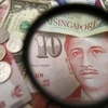 Singapore tightens monetary policy 