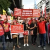 Philippine workers march to call for labour issue settlement